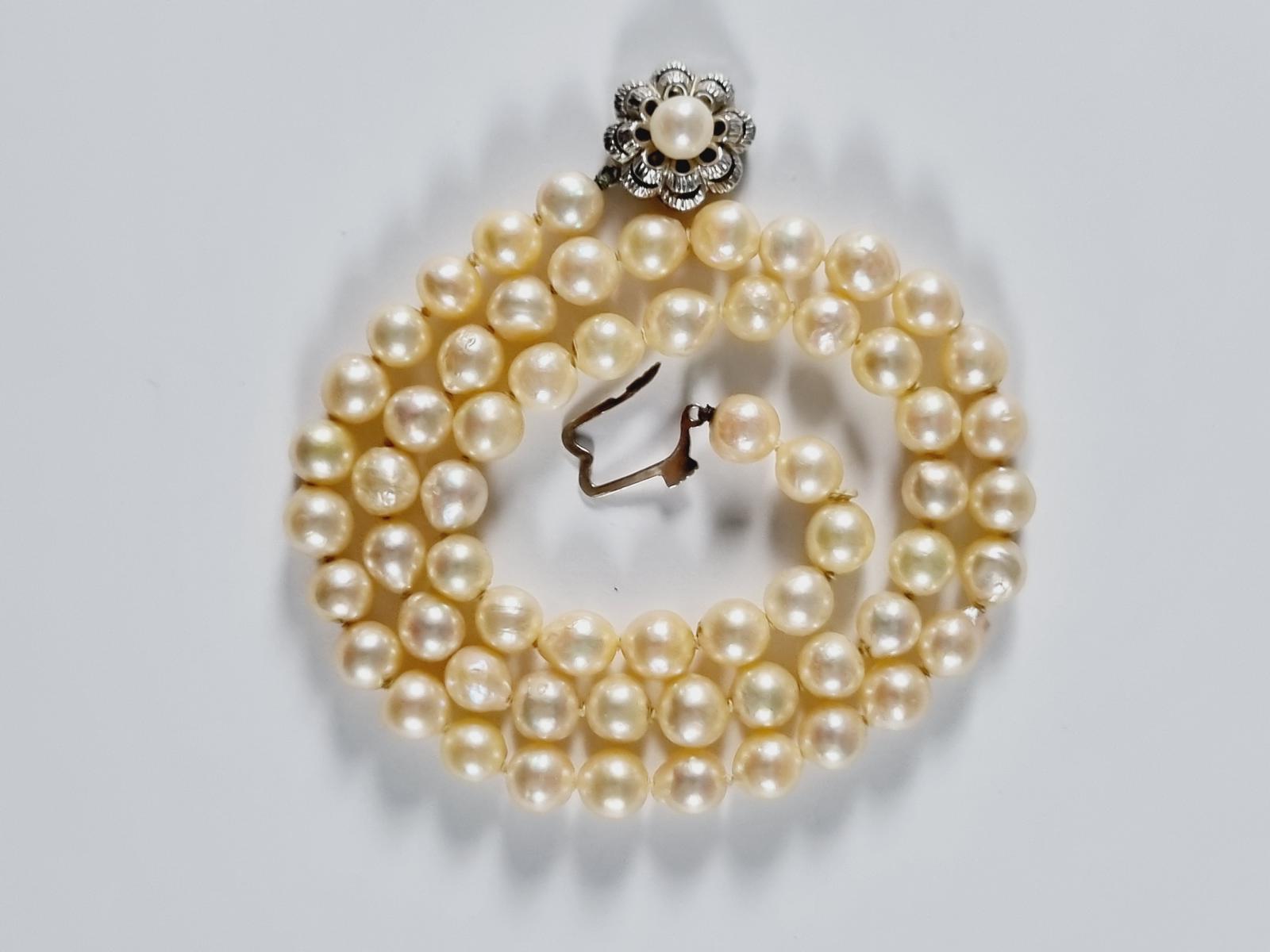 Perlenkette mit 14 Karat Gelb- und Weißgoldverschluß