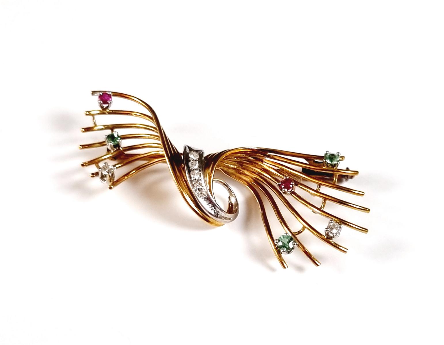 Brosche mit facettierten Edelsteinen, 18 Karat Gelb- und Weißgold ...